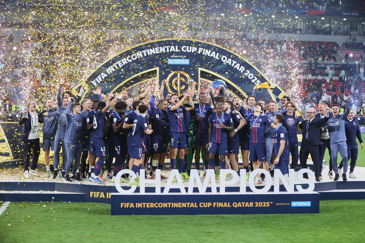 PSG's Goncalo Ramos lifts the trophy after winning the FIFA Intercontinental Cup final soccer match between Flamengo and Paris Saint-Germain in Doha, Qatar, Wednesday, Dec. 17, 2025. (AP Photo/Hussein Sayed)
