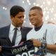 FILE - PSG President Nasser Al-Khelaifi, left, speaks to PSG's Kylian Mbappe as it is announced he has signed a three year extension to his contract, at the Parc des Princes stadium in Paris, France, Saturday, May 21, 2022. (AP Photo/Michel Spingler, File)