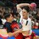 Spain's Alicia Fernandez Fraga, left, tackles Serbia's Jovana Skrobic during the women's handball World Championship match between Spain and Serbia in Dortmund, Germany, Tuesday, Dec. 2, 2025. (Federico Gambarini/dpa via AP)