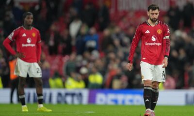 Manchester United's Bruno Fernandes walks off the pitch after a Premier League soccer match between Manchester United and Bournemouth in Manchester, England, Monday, Dec. 15, 2025. (AP Photo/Jon Super)