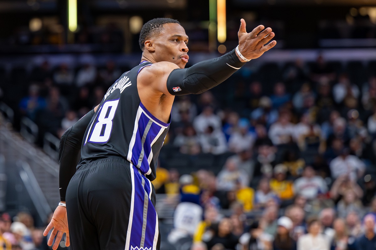 Sacramento Kings guard Russell Westbrook reacts after scoring during the first half of an NBA basketball game against the Indiana Pacers in Indianapolis, Monday, Dec. 8, 2025. (AP Photo/Doug McSchooler)