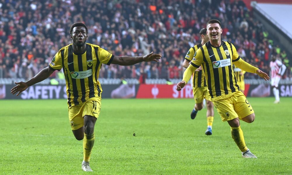 AEK Athens' Aboubakary Koita, left, celebrates after scoring his side's second goal during the Europa Conference League opening phase soccer match between Samsunspor and AEK Athens, in Samsun, Turkey, Thursday, Dec. 11, 2025. (AP Photo/Nurgul Gunaydin)