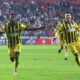 AEK Athens' Aboubakary Koita, left, celebrates after scoring his side's second goal during the Europa Conference League opening phase soccer match between Samsunspor and AEK Athens, in Samsun, Turkey, Thursday, Dec. 11, 2025. (AP Photo/Nurgul Gunaydin)