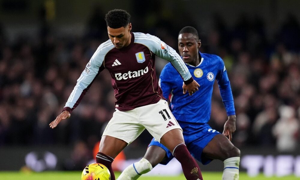 Aston Villa's Ollie Watkins, left and Chelsea's Trevoh Chalobah vie for the ball, during the English Premier League soccer match between Chelsea and Aston Villa,vat Stamford Bridge, in London, Saturday, Dec. 27, 2025. (Adam Davy/PA via AP)