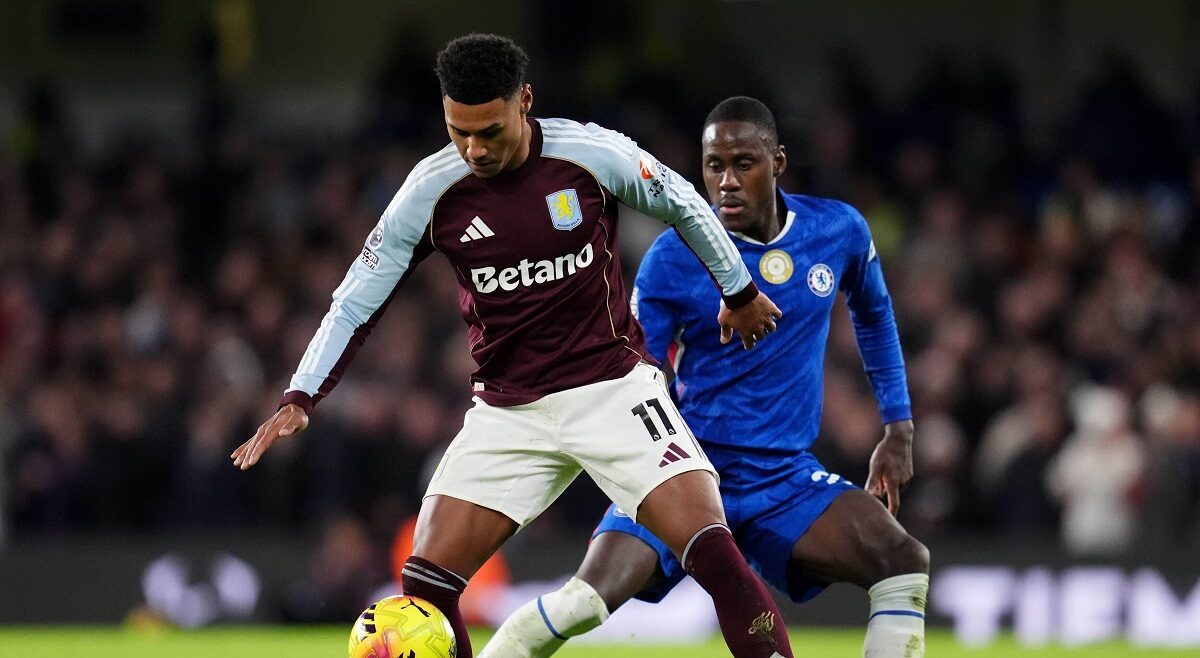Aston Villa's Ollie Watkins, left and Chelsea's Trevoh Chalobah vie for the ball, during the English Premier League soccer match between Chelsea and Aston Villa,vat Stamford Bridge, in London, Saturday, Dec. 27, 2025. (Adam Davy/PA via AP)