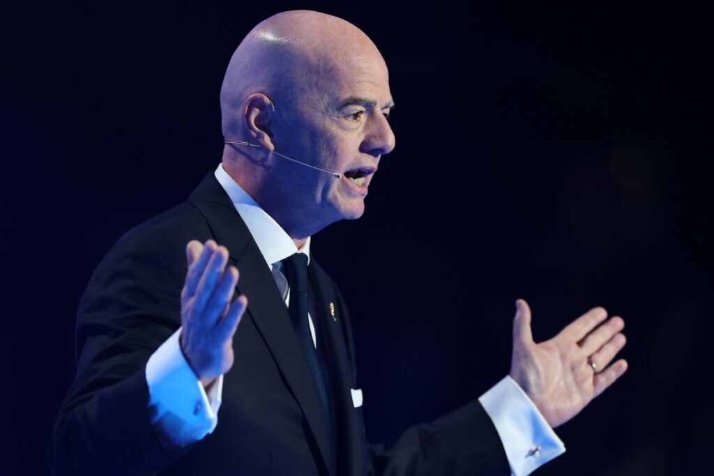 FIFA President Gianni Infantino speaks during the draw for the 2026 soccer World Cup at the Kennedy Center in Washington, Friday, Dec. 5, 2025. (Dan Mullan/Pool Photo via AP)