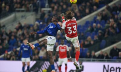 Everton's Thierno Barry, left, and Arsenal's Riccardo Calafiori vie for the ball during the English Premier League soccer match between Everton and Arsenal in Liverpool, England, Saturday, Dec. 20, 2025. (AP Photo/Ian Hodgson)