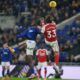 Everton's Thierno Barry, left, and Arsenal's Riccardo Calafiori vie for the ball during the English Premier League soccer match between Everton and Arsenal in Liverpool, England, Saturday, Dec. 20, 2025. (AP Photo/Ian Hodgson)