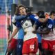 Hamburg's Luka Vuskovic, front, celebrates after scoring his side's second goal during the German Bundesliga soccer match between Hamburger SV and SV Werder Bremen in Hamburg, Germany, Sunday, Dec. 7, 2025. (Marcus Brandt/dpa via AP)