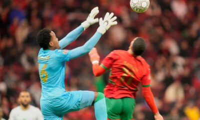 Comoros' goalkeeper Yannick Marc Ahmed Pandor catches the ball during the Africa Cup of Nations group A soccer match between Morocco and Comoros in Rabat, Morocco, Sunday, Dec. 21, 2025. (AP Photo/Mosa'ab Elshamy)