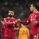Liverpool's Mohamed Salah, left, and Virgil van Dijk greet each other after the English Premier League soccer match between Liverpool and Sunderland in Liverpool, Wednesday, Dec. 3, 2025. (AP Photo/Jon Super)