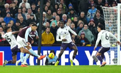 Aston Villa's Morgan Rogers, second left, scores their side's second goal of the game during the Premier League soccer match between Aston Villa and Manchester United, in Birmingham, England, Sunday Dec. 21, 2025. (Jacob King/PA via AP)