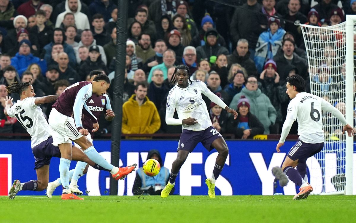 Aston Villa's Morgan Rogers, second left, scores their side's second goal of the game during the Premier League soccer match between Aston Villa and Manchester United, in Birmingham, England, Sunday Dec. 21, 2025. (Jacob King/PA via AP)