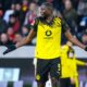 Dortmund's Serhou Guirassy reacts during the German Bundesliga soccer match between SC Freiburg and Borussia Dortmund in Freiburg, Germany, Sunday, Dec. 14, 2025. (Tom Weller/dpa via AP)