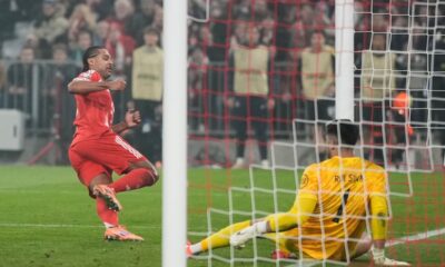 Bayern's Serge Gnabry, left, scores his side's opening goal during the Champions League opening phase soccer match between FC Bayern Munich and Sporting CP in Munich, Germany, Tuesday, Dec. 9, 2025. (AP Photo/Matthias Schrader)