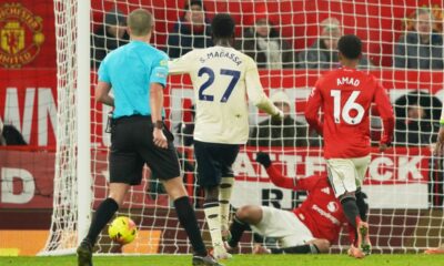 West Ham's Soungoutou Magassa, centre, scores his side's opening goal during the English Premier League soccer match between Manchester United and West Ham United in Manchester, England, Thursday, Dec. 4, 2025. (AP Photo/Ian Hodgson)