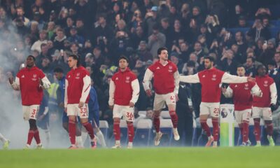 Arsenal players arrive ahead of their English Premier League soccer match between Chelsea and Arsenal in London, England, Sunday, Nov. 30, 2025. (AP Photo/Ian Walton)