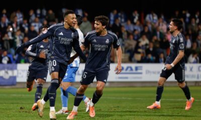 Real Madrid's Kylian Mbappe celebrates after scoring from a penalty kick during the Copa del Rey soccer match between Talavera and Real Madrid, in Talavera de la Reina, Spain, Wednesday, Dec. 17, 2025. (AP Photo/M. Berengui)