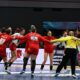Serbia's players celebrate their win over Spain after the women's handball World Championship match between Spain and Serbia in Dortmund, Germany, Tuesday, Dec. 2, 2025. (Federico Gambarini/dpa via AP)
