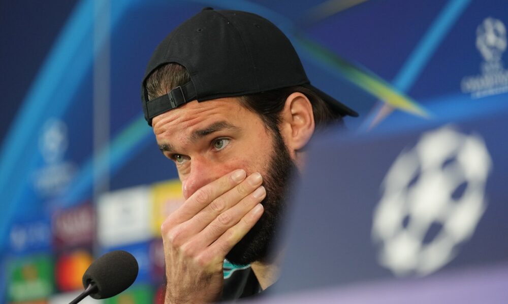 Liverpool's goalkeeper Alisson attends a press conference ahead of the Champions League opening phase soccer match between Inter Milan and Liverpool on Tuesday, in Milan, Italy, Monday, Dec. 8, 2025. (AP Photo/Antonio Calanni)