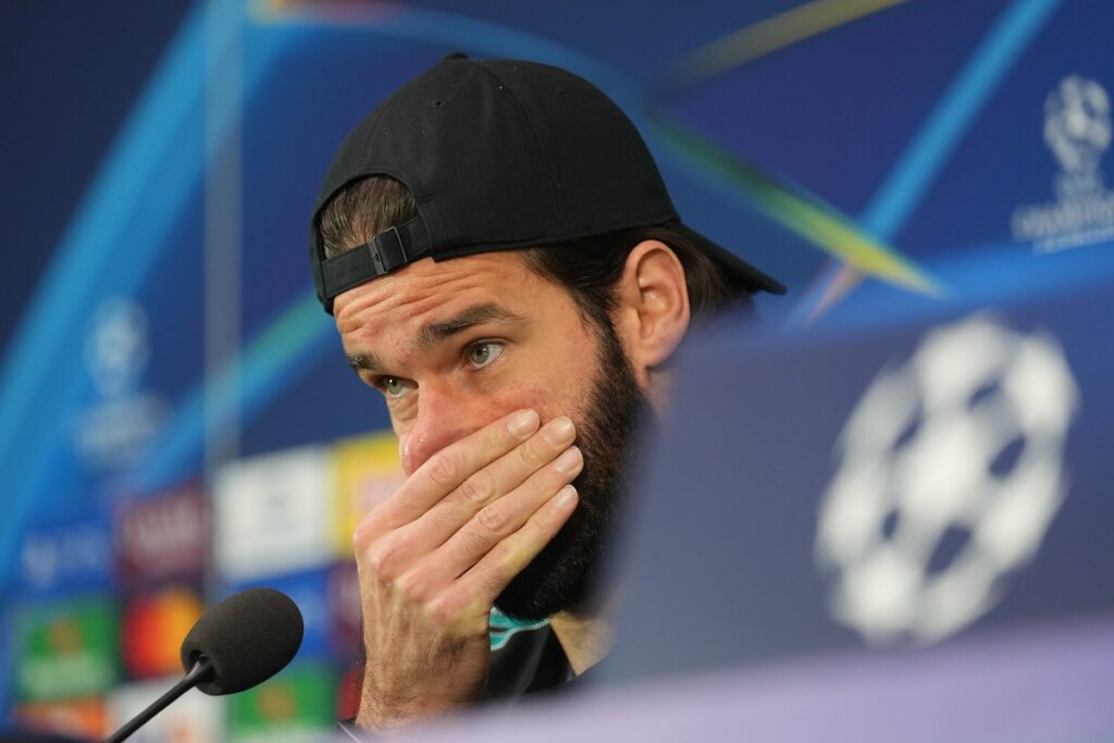 Liverpool's goalkeeper Alisson attends a press conference ahead of the Champions League opening phase soccer match between Inter Milan and Liverpool on Tuesday, in Milan, Italy, Monday, Dec. 8, 2025. (AP Photo/Antonio Calanni)