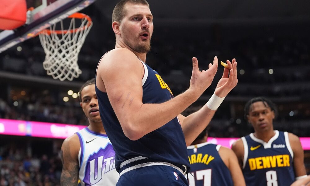 Denver Nuggets center Nikola Jokić argues for a call in the second half of an NBA basketball game against the Utah Jazz, Monday, Dec. 22, 2025, in Denver. (AP Photo/David Zalubowski)
