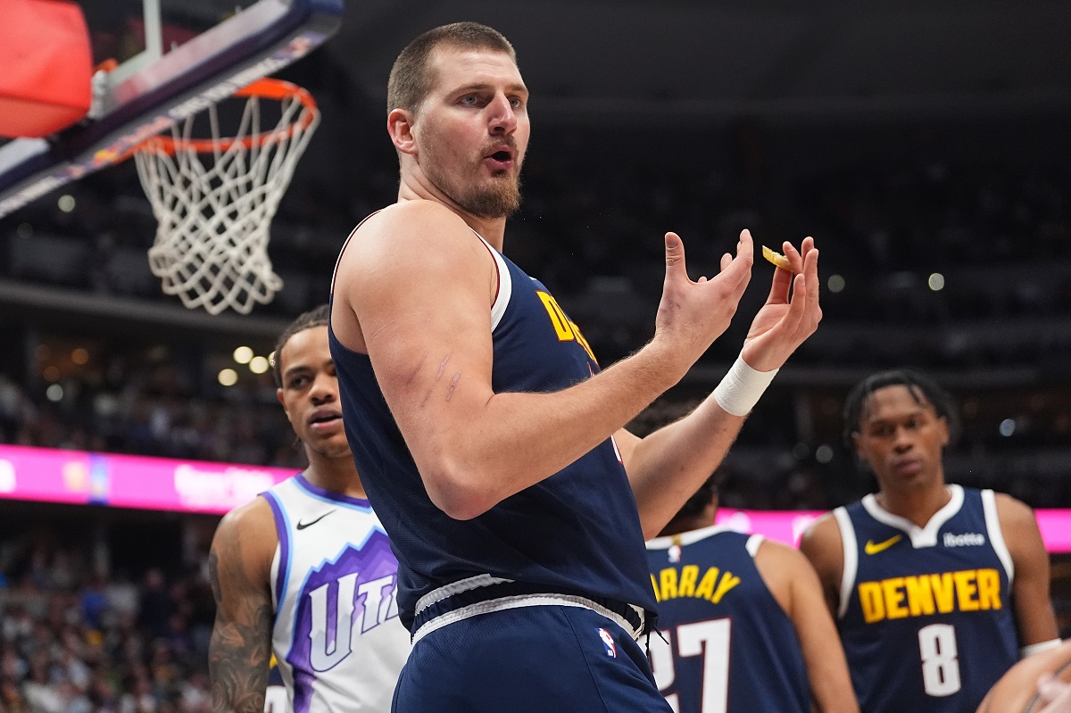 Denver Nuggets center Nikola Jokić argues for a call in the second half of an NBA basketball game against the Utah Jazz, Monday, Dec. 22, 2025, in Denver. (AP Photo/David Zalubowski)
