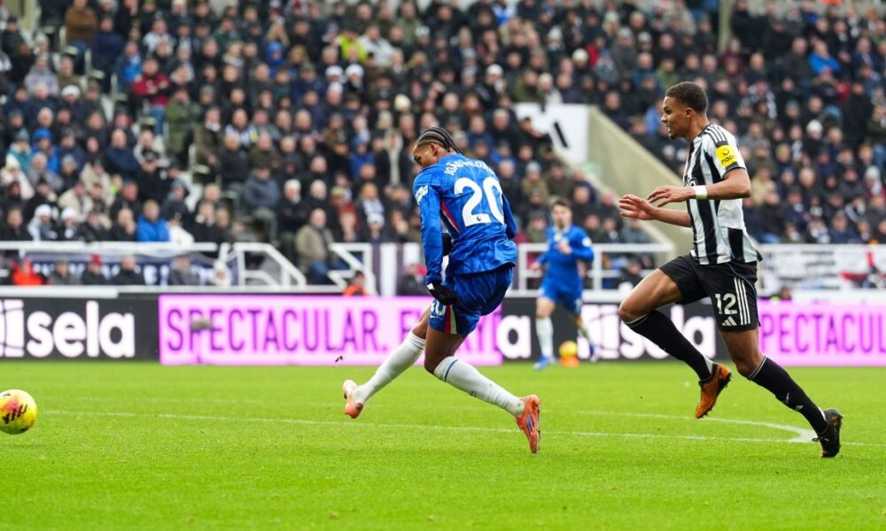 Chelsea's Joao Pedro, left, scores his side's second goal during the English Premier League soccer match between Newcastle United and FC Chelsea in Newcastle, England, Saturday, Dec. 20, 2025. (Owen Humphreys/PA via AP)