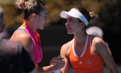 Aryna Sabalenka, left, of Belarus is congratulated by Iva Jovic of the U.S. following their quarterfinal match at the Australian Open tennis championship in Melbourne, Australia, Tuesday, Jan. 27, 2026. (AP Photo/Dar Yasin)