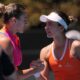 Aryna Sabalenka, left, of Belarus is congratulated by Iva Jovic of the U.S. following their quarterfinal match at the Australian Open tennis championship in Melbourne, Australia, Tuesday, Jan. 27, 2026. (AP Photo/Dar Yasin)