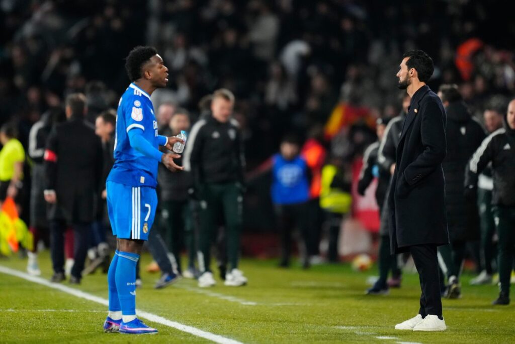 Real Madrid's Vinicius Junior, left, and Real Madrid's head coach Alvaro Arbeloa react during the Copa del Rey round of 16 soccer match between Albacete and Real Madrid, in Albacete, Spain, Wednesday, Jan. 14, 2026. (AP Photo/Jose Breton)