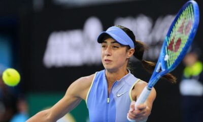 Olga Danilovic of Serbia plays a forehand return to Venus Williams of the U.S. during their first round match at the Australian Open tennis championship in Melbourne, Australia, Sunday, Jan. 18, 2026. (AP Photo/Aaron Favila)