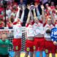 Denmark's players attempt to block against Iceland's Thorsteinn Leo Gunnarsson during the Euro 2026 semifinal match between Denmark and Iceland at in Herning, Denmark, Friday, Jan. 30, 2026. (Bo Amstrup/Ritzau Scanpix via AP)