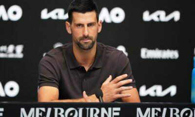Novak Djokovic of Serbia reacts during a press conference ahead of the Australian Open tennis championship in Melbourne, Australia, Saturday, Jan. 17, 2026. (AP Photo/Aaron Favila)