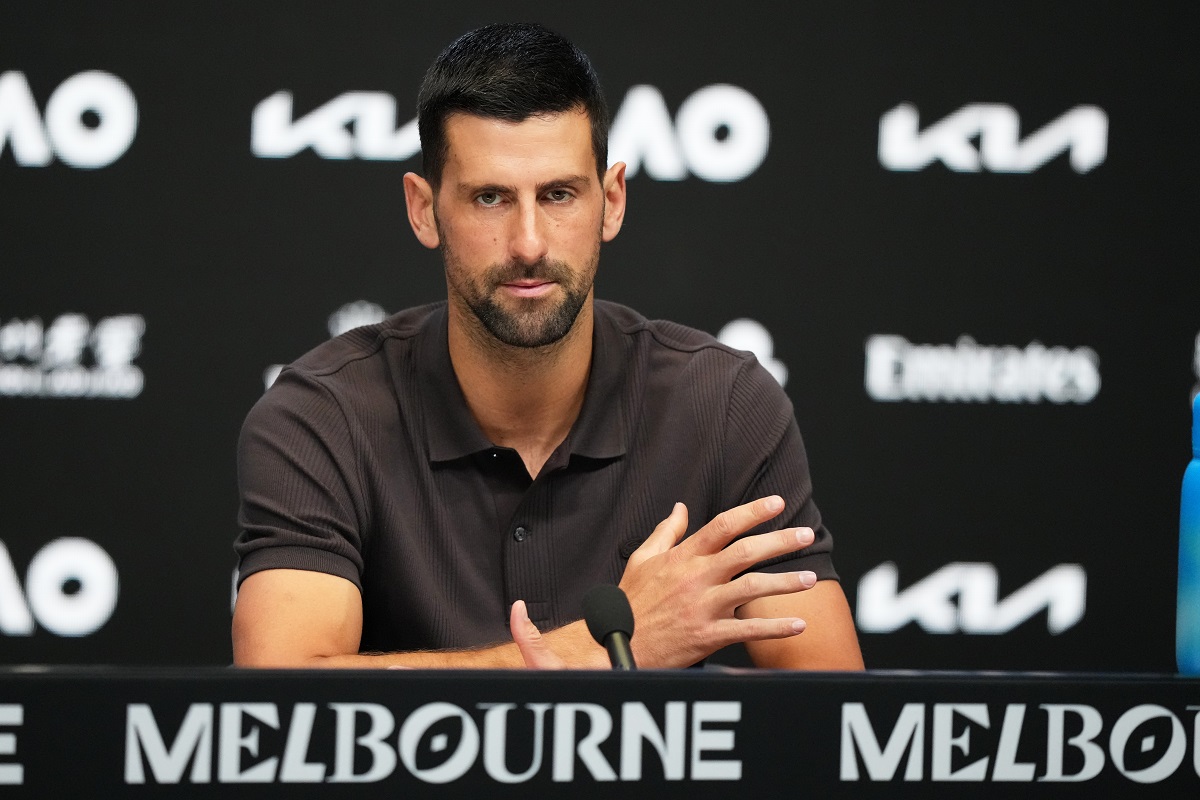 Novak Djokovic of Serbia reacts during a press conference ahead of the Australian Open tennis championship in Melbourne, Australia, Saturday, Jan. 17, 2026. (AP Photo/Aaron Favila)