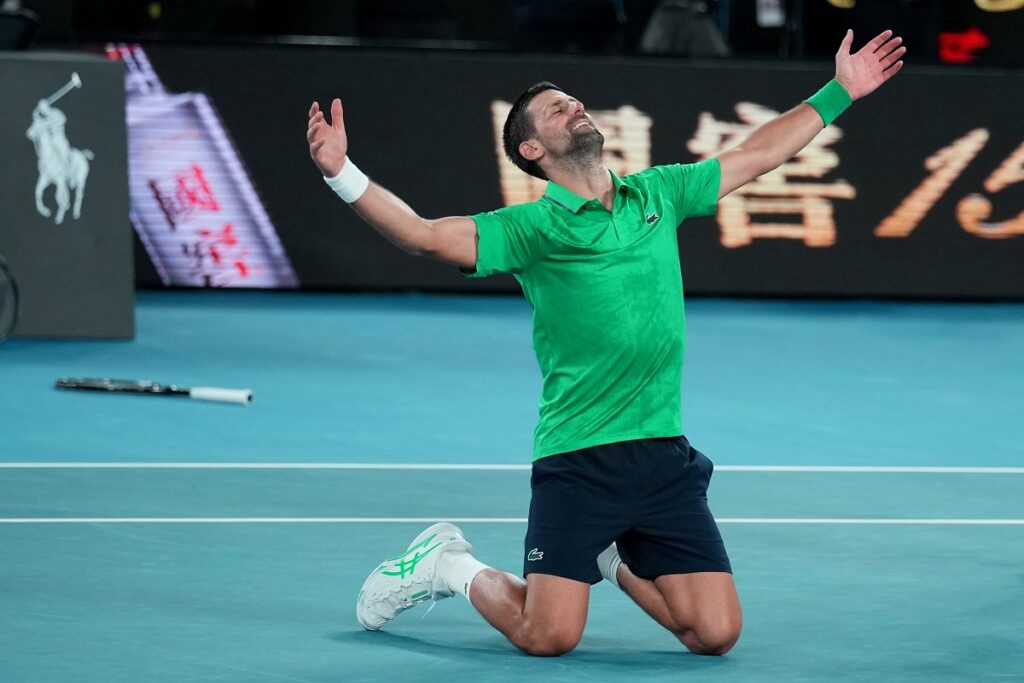 Novak Djokovic of Serbia celebrates after defeating Jannik Sinner of Italy in their semifinal match at the Australian Open tennis championship in Melbourne, Australia, early Saturday, Jan. 31, 2026. (AP Photo/Dita Alangkara)