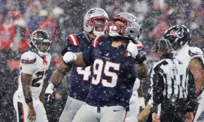 New England Patriots defensive tackle Khyiris Tonga (95) celebrates after sacking Houston Texans quarterback C.J. Stroud during the second half of an NFL divisional playoff football game, Sunday, Jan. 18, 2026, in Foxborough, Mass. (AP Photo/Mark Stockwell)