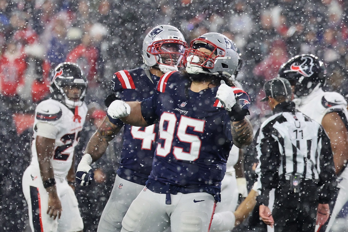 New England Patriots defensive tackle Khyiris Tonga (95) celebrates after sacking Houston Texans quarterback C.J. Stroud during the second half of an NFL divisional playoff football game, Sunday, Jan. 18, 2026, in Foxborough, Mass. (AP Photo/Mark Stockwell)