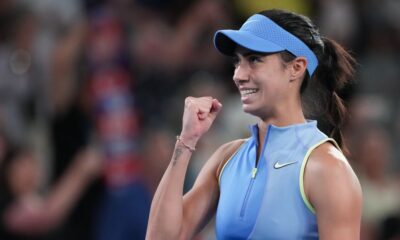 Olga Danilovic of Serbia reacts after defeating Venus Williams of the U.S. in their first round match at the Australian Open tennis championship in Melbourne, Australia, Sunday, Jan. 18, 2026. (AP Photo/Aaron Favila)