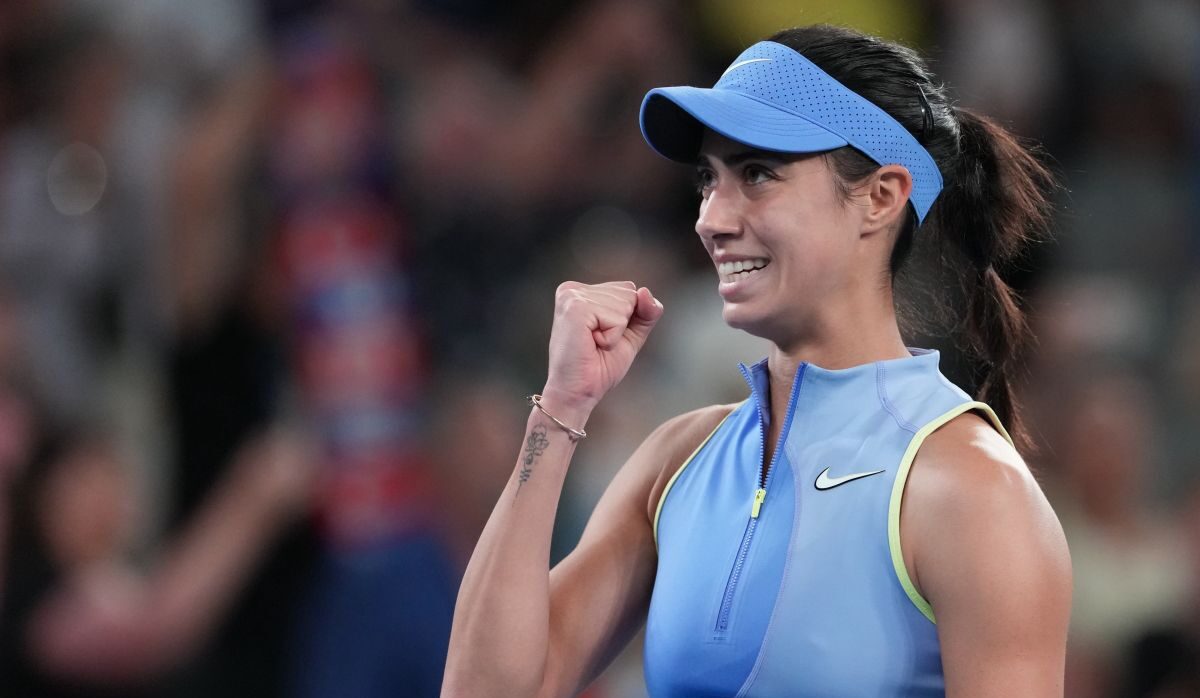 Olga Danilovic of Serbia reacts after defeating Venus Williams of the U.S. in their first round match at the Australian Open tennis championship in Melbourne, Australia, Sunday, Jan. 18, 2026. (AP Photo/Aaron Favila)