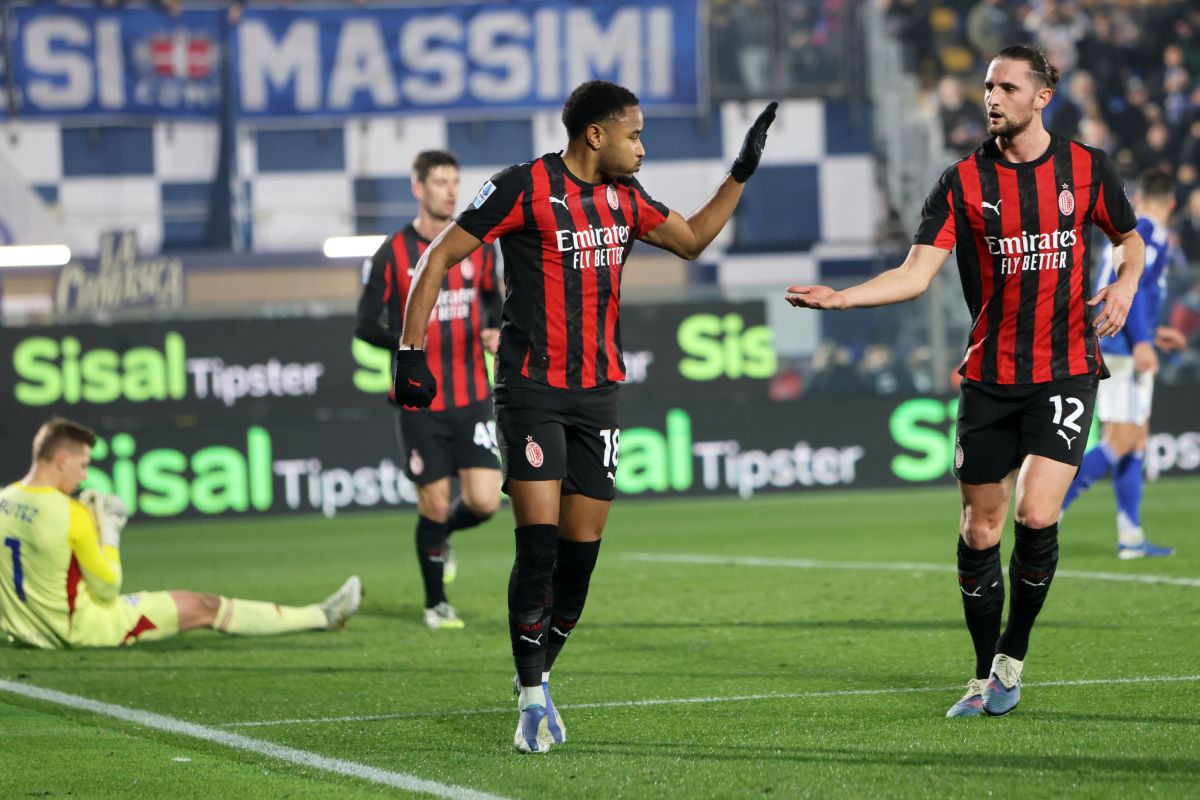 AC Milan's Christopher Nkunku celebrates scoring during the Serie A soccer match between Como and Milan in Como, Italy, Thursday Jan. 15, 2026. (Antonio Saia/LaPresse via AP)