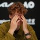 Jannik Sinner of Italy reacts during a press conference following his semifinal loss to Novak Djokovic of Serbia at the Australian Open tennis championship in Melbourne, Australia, Saturday, Jan. 31, 2026. (AP Photo/Dita Alangkara)