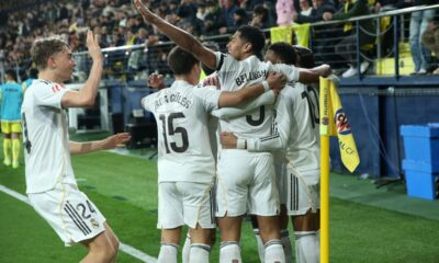 Real Madrid players celebrate after Kylian Mbappe scored the opening goal during a Spanish La Liga soccer match between Villarreal and Real Madrid in Villarreal, Spain, Saturday, Jan. 24, 2026. (AP Photo/Alberto Saiz)