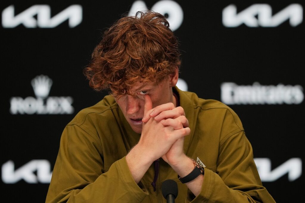 Jannik Sinner of Italy reacts during a press conference following his semifinal loss to Novak Djokovic of Serbia at the Australian Open tennis championship in Melbourne, Australia, Saturday, Jan. 31, 2026. (AP Photo/Dita Alangkara)