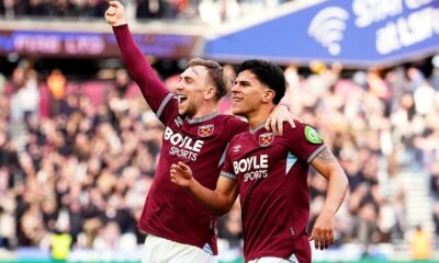 West Ham United's Mateus Fernandes, right,celebrates scoring his side's third goal with teammate Jarrod Bowen, during the English Premier League soccer match between West Ham United and Sunderland in London, Saturday Jan. 24, 2026. ( Jordan Pettitt/PA via AP)