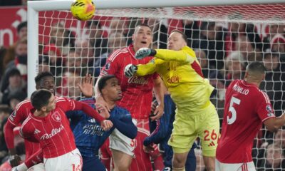 Nottingham Forest's goalkeeper Matz Sels leaps for the ball during the English Premier League soccer match between Nottingham Forest and Arsenal in Nottingham, England, Saturday, Jan. 17, 2026. (AP Photo/Dave Shopland)
