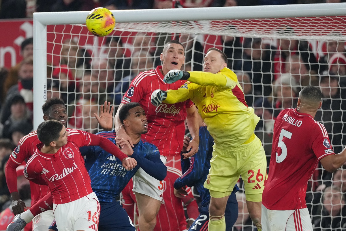 Nottingham Forest's goalkeeper Matz Sels leaps for the ball during the English Premier League soccer match between Nottingham Forest and Arsenal in Nottingham, England, Saturday, Jan. 17, 2026. (AP Photo/Dave Shopland)