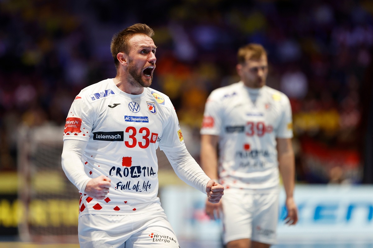 Croatia's Luka Cindric celebrates a goal during the European Championship handball match between Croatia and Georgia, in Malmo, Sweden, Saturday Jan. 17, 2026. (Andreas Hillergren/Ritzau Scanpix via AP)