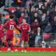 Liverpool's Florian Wirtz (7) is congratulated after scoring his side's opening goal during the English Premier League soccer match between Liverpool and Burnley in Liverpool, England, Saturday, Jan. 17, 2026. (AP Photo/Jon Super)