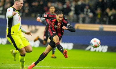 rankfurt's Younes Ebnoutalib scores his side's second goal during the Bundesliga soccer match between Eintracht Frankfurt and Borussia Dortmund in Frankfurt, Germany, Friday, Jan. 9, 2026. (AP Photo/Michael Probst)